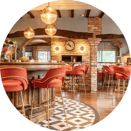 an image of a brightly lit Browns bar area with high bar stools and tables